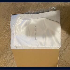 Size 9 Ballerina Michael Kors. Never worn , dust bag and tags still on items.